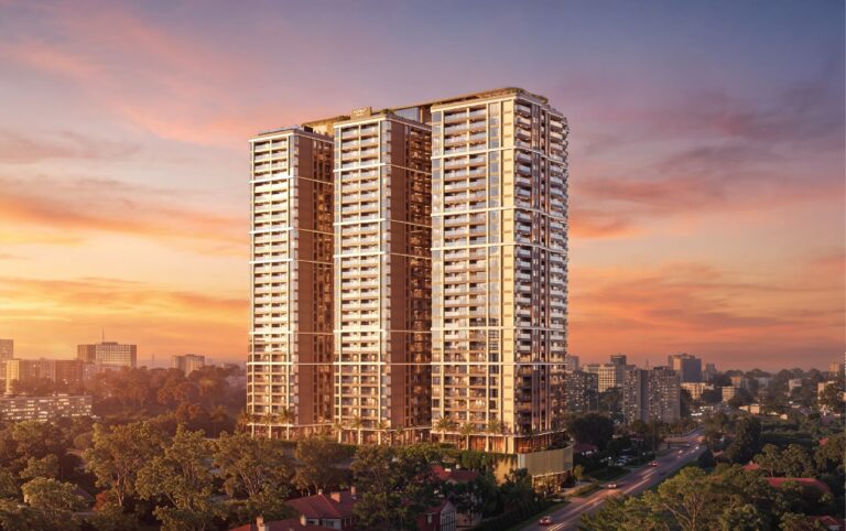 The Moment Residences architectural render: residential towers at sunset